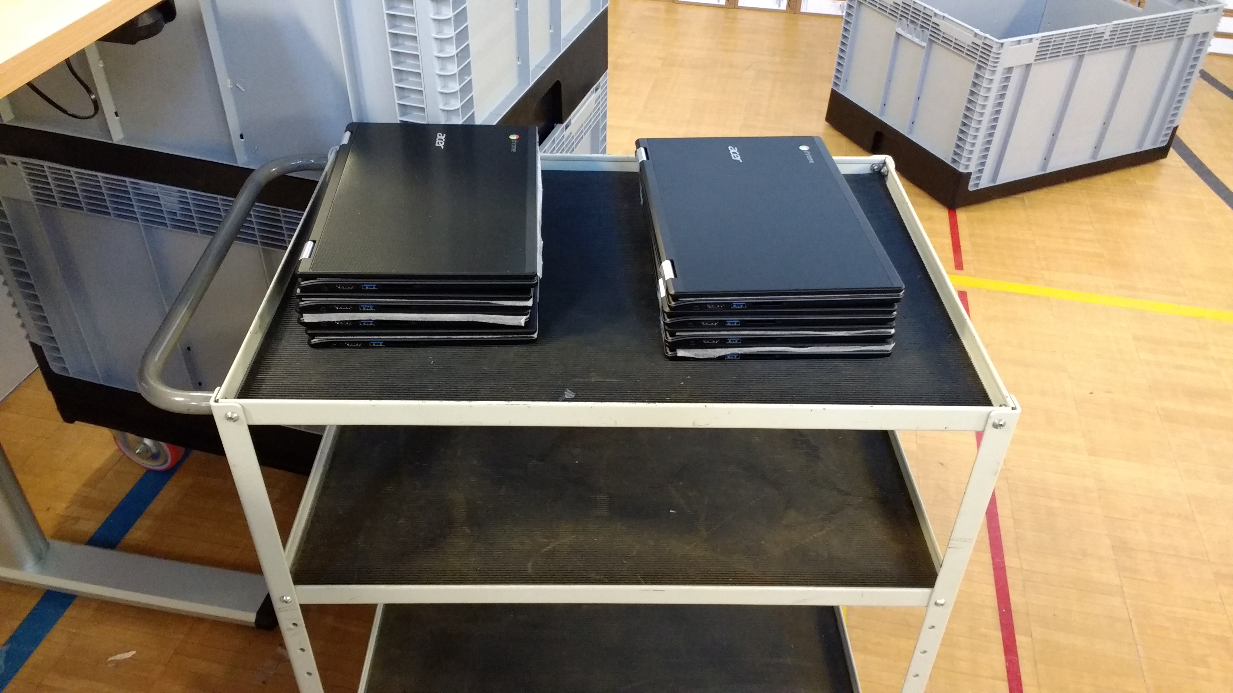 Trolley with unpacked Chromebooks